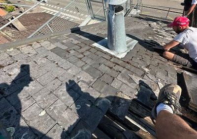 Rénovation de toiture et de charpente avec pose de tuiles Alpha à Annecy