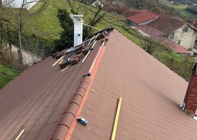 Nouvelle couverture en tuiles après rénovation complète à Cran-Gevrier